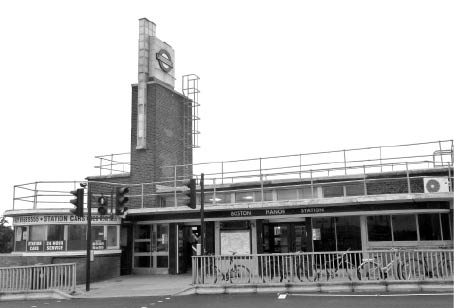 Figure 9. Boston Manor station in 2013. No careful renovation of LU's heritage here, but a crude and clumsy addition of ugly roof railings to meet modern safety requirements