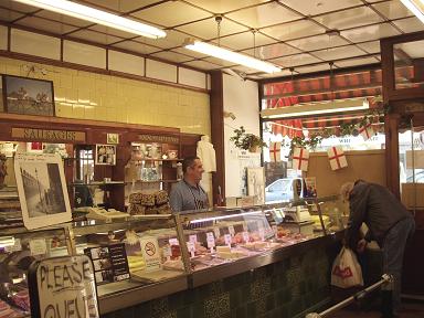 Deptford shop with a Mr Kennedy behind the counter. © Ben Rayner