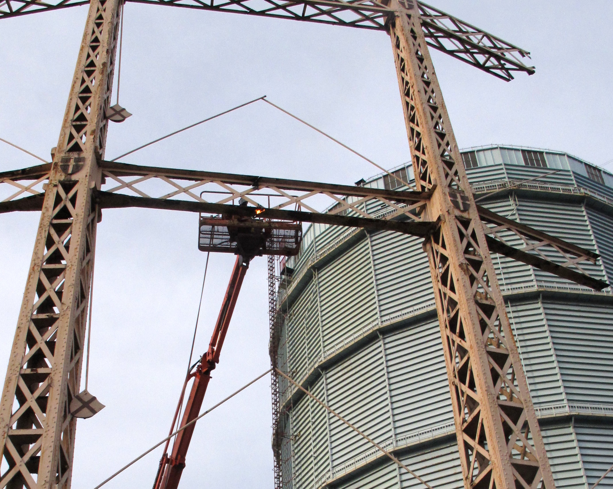 Dismantling the Morton gasholder - crests hanging prior to removal, 9 Dec 2014. © Sarah Timewell