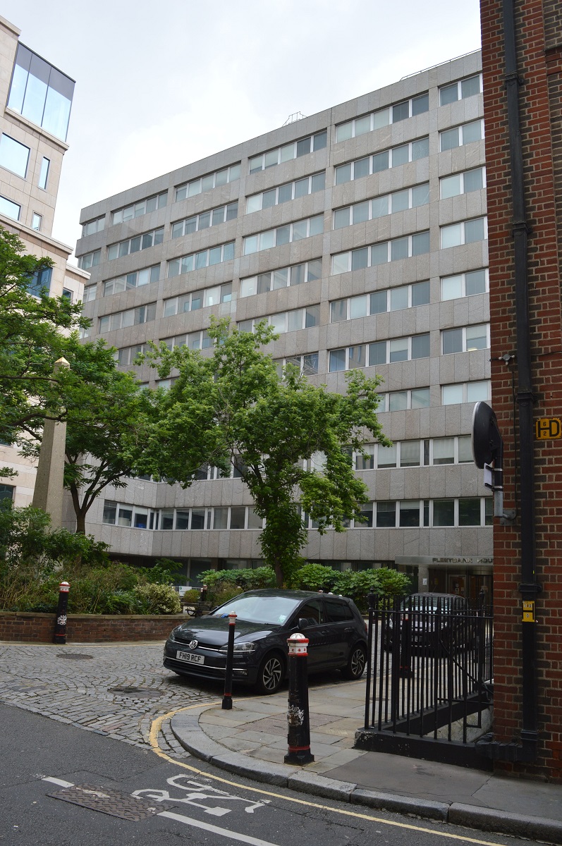 Coming down on south side of Fleet St — a former bank, Chronicle House and a newer building